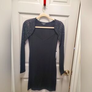 Bebe black sweater dress with sequin size med. new with tags